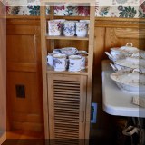 F92. Narrow stand with lower cabinet.